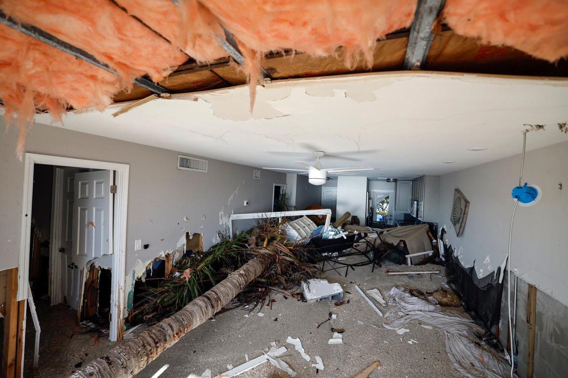 Storm surge and wind from hurricanes Helene and Milton caused beach erosion and damaged condos at Fisherman’s Cove beach front condominium rentals on Siesta Key, Florida on Thursday, October 10, 2024.