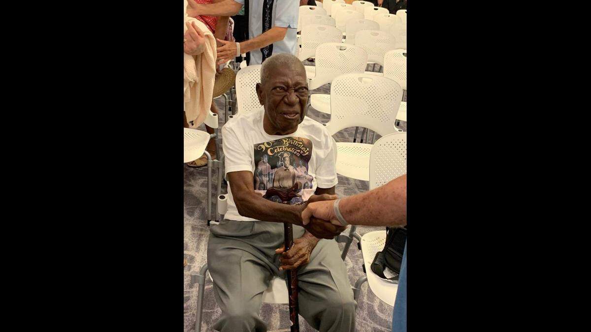 Lofton ‘Coffee’ Butler gets congratulated at City Hall for having the Key West amphitheater named after him on Aug. 6, 2019.