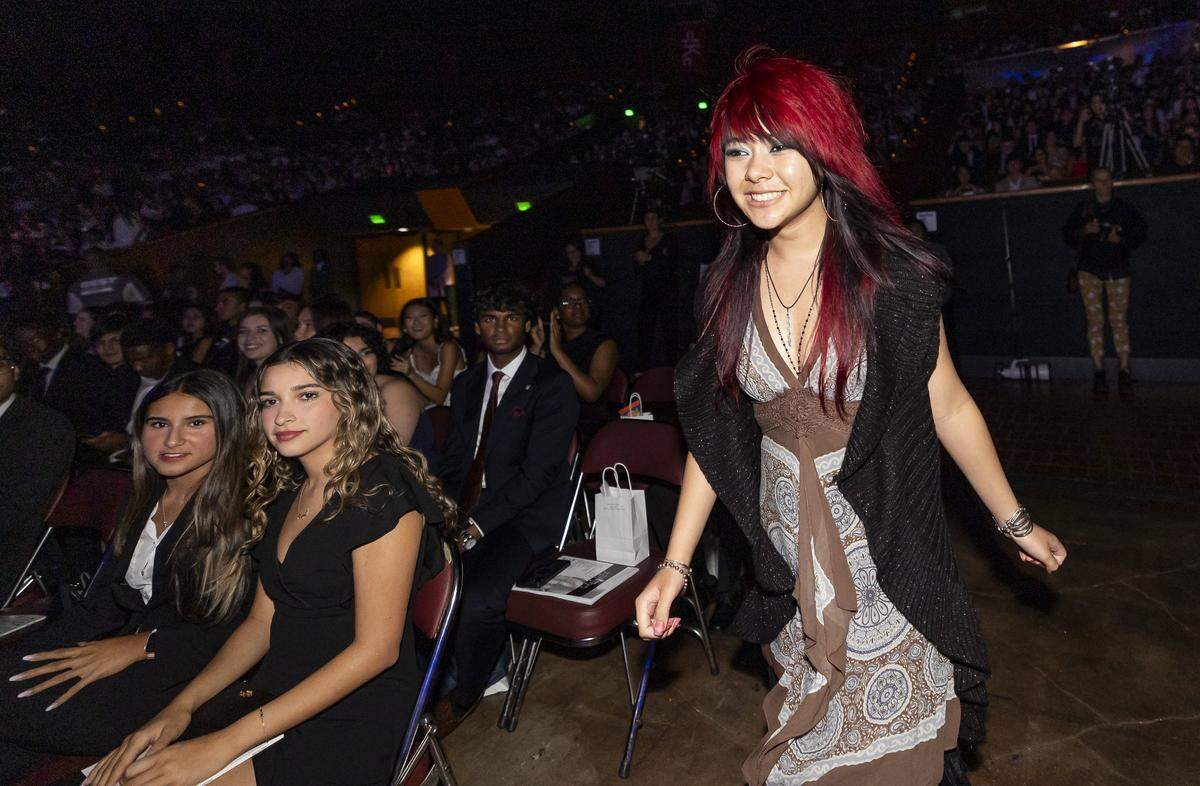 Silver Knight winner Colette Marquez, North Broward Preparatory School, walks to the stage after winning in the Art category.