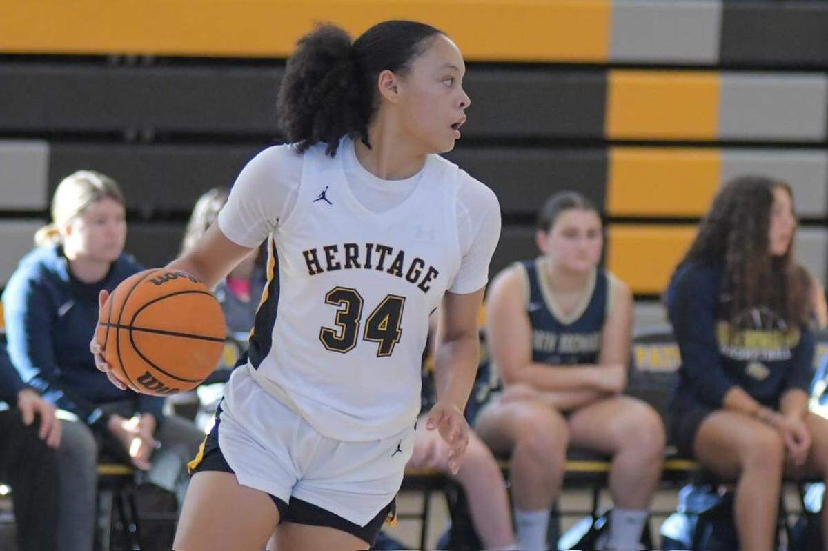 American Heritage guard Jasleen Green takes the ball up the court in a regular-season game against North Broward Prep on Saturday, Jan. 7, 2023.