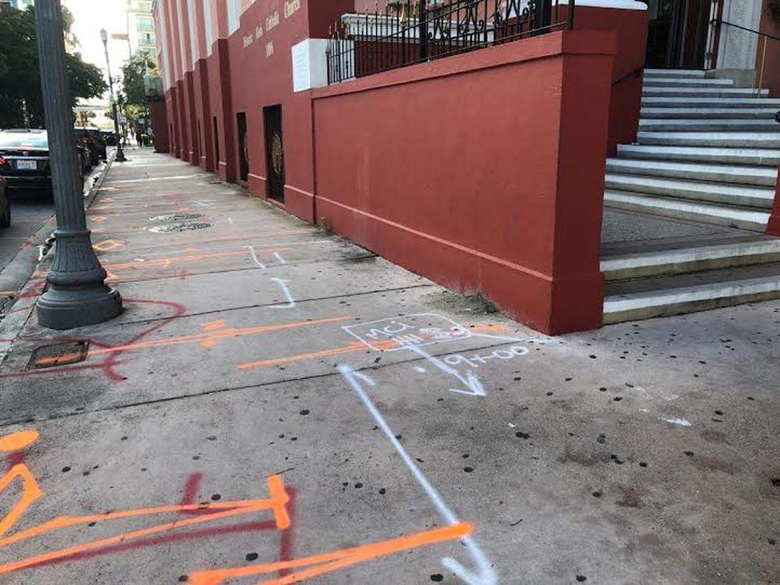 Spray-painted installation markings, or ‘hieroglyphics,’ on a downtown Miami sidewalk.