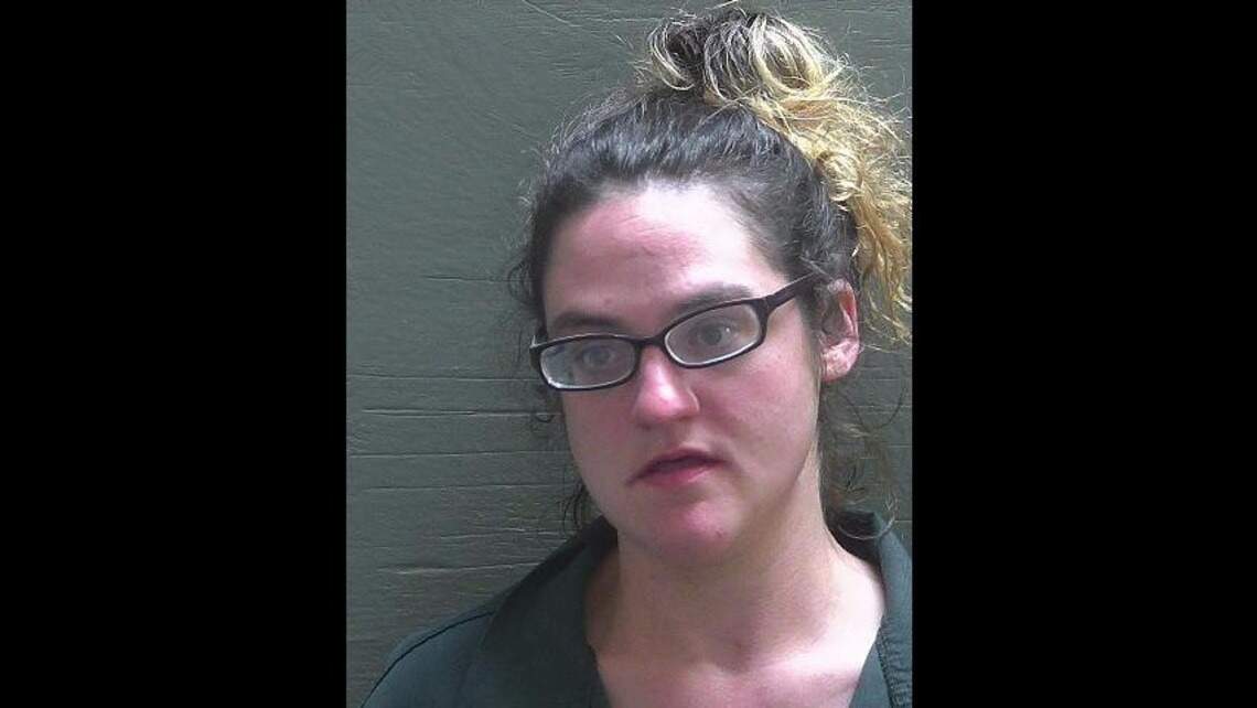 She cut herself on a window then tried splashing her hepatitis C blood on a nurse: cops