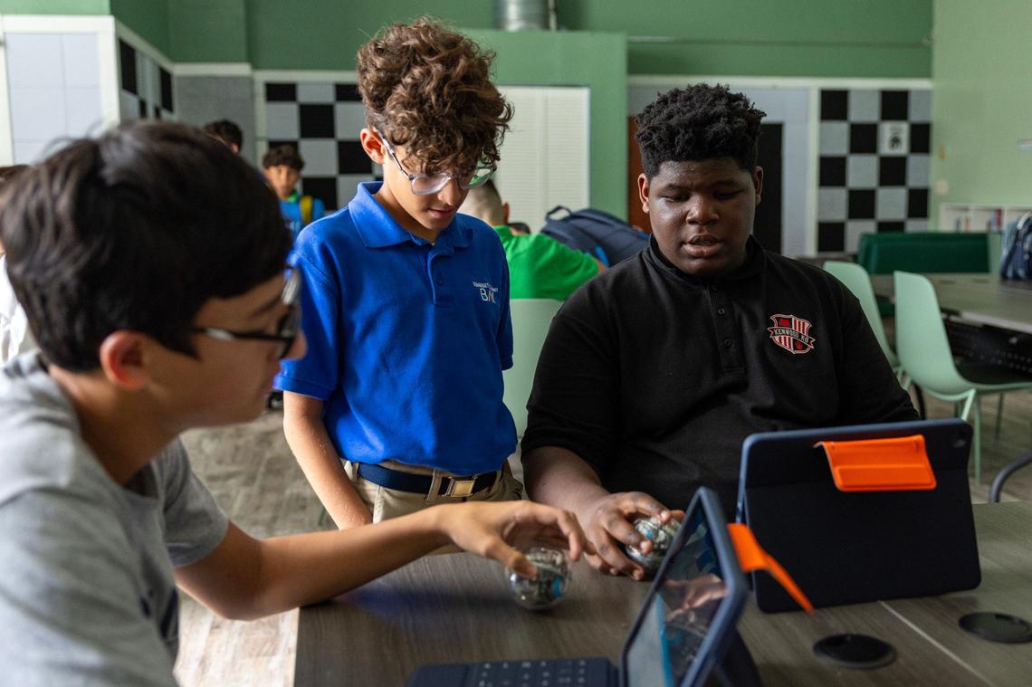 Kids play with Sphero BOLT+, a round programmable robot, during a STEM activity for an after school care program at Boys & Girls Clubs of Miami-Dade on Tuesday, September 17, 2024, in Miami, Fla.