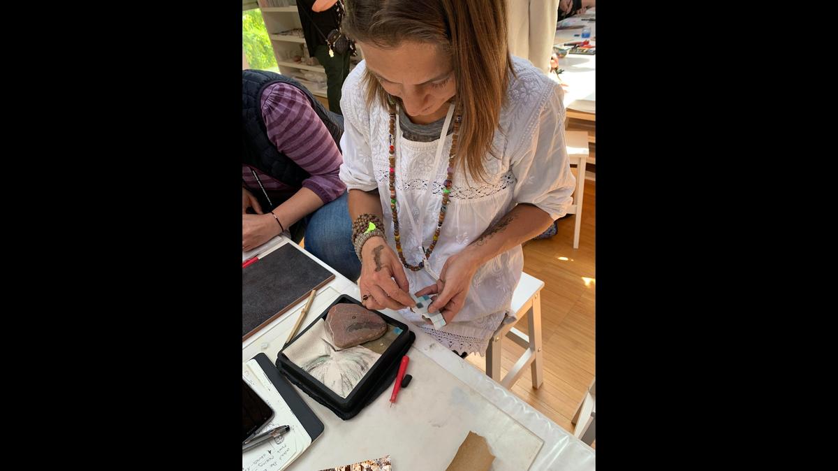 Lee Friedman, a lead teacher at Temple Beth Sholom Innovative School, participates in a hands-on activity during the week-long learning experience in Reggio, Italy.
