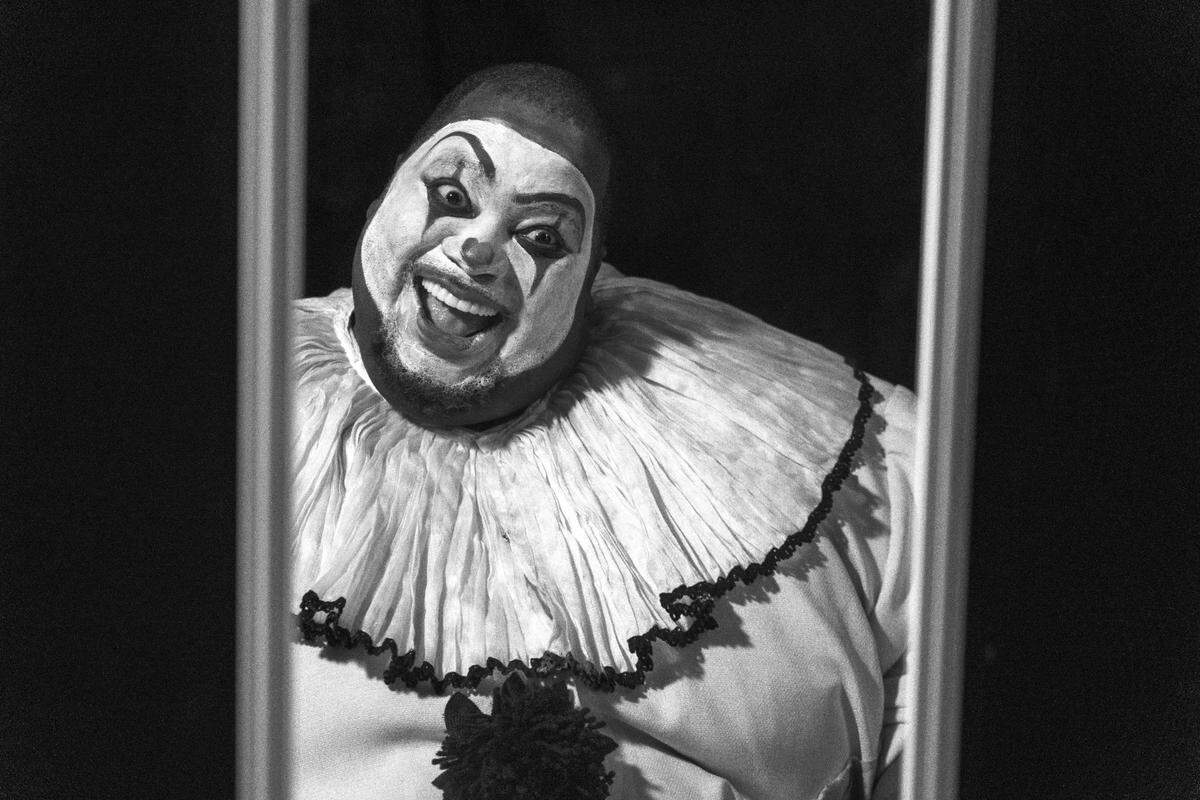 Playing the role of “Canio” opera singer Limmie Pulliam takes one last look at his makeup backstage before heading on stage for the closing act during the full rehearsal of “I Plagliacci” at the Adrienne Arsht Center’s Sanford and Dolores Ziff Ballet Opera House on Thursday, January 25, 2024, in Miami, Florida.