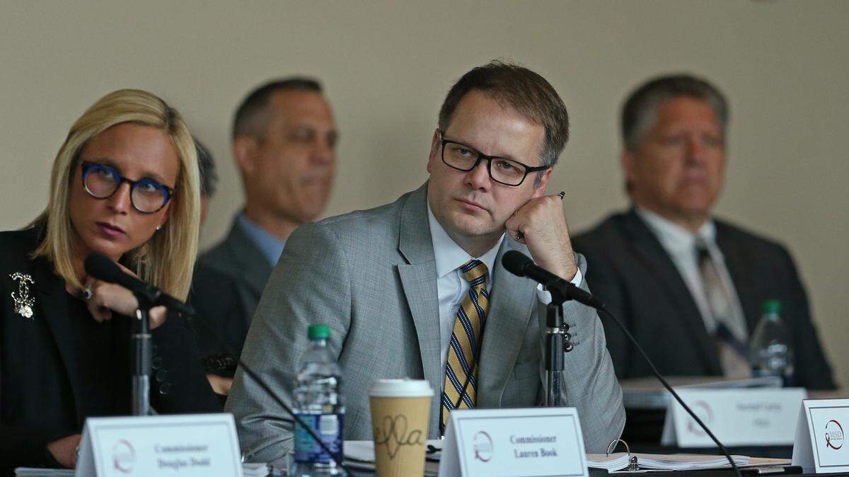 Ryan Petty, who lost his 14-year-old daughter, Alaina, in the shooting looks on during the Marjory Stoneman Douglas High School Public Safety Commission meeting at the BB&T Center on Thursday, June 7, 2018, in Davie. Petty is now on the State Board of Education.