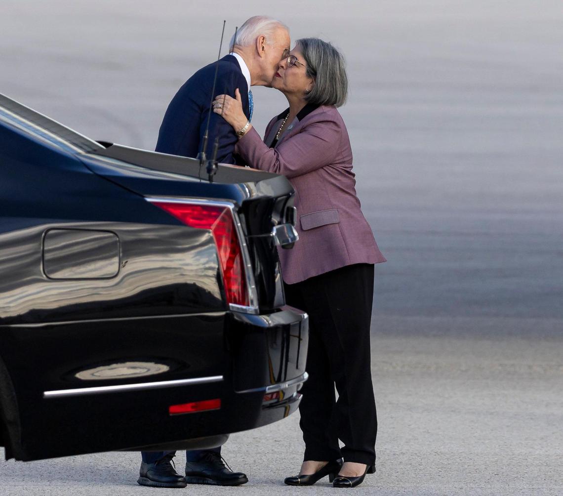 President Joe Biden greets Miami-Dade Mayor Daniella Levine Cava after arriving at Miami International Airport on Tuesday, Jan. 30, 2024, in Miami. President Biden was attending a fundraiser in Coral Gables.