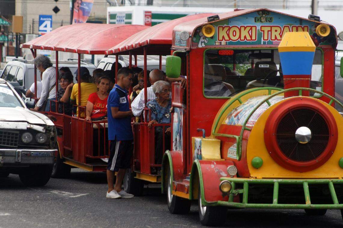 In Maracaibo, Venezuela, workers are resorting to all sorts of illegal transportation, including a train meant for children, to get around. The private vehicles are nicknamed "kennels" for their unsafe conditions.