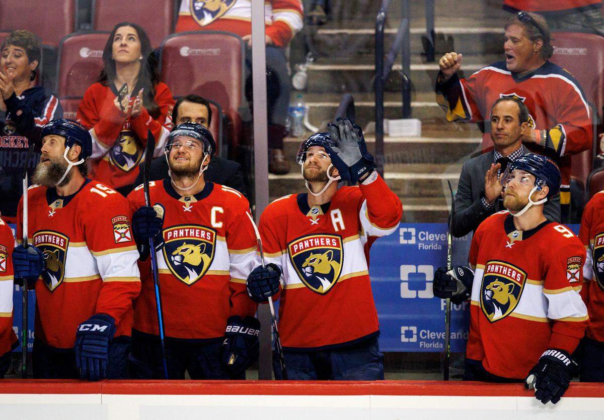Florida Panthers left wing Jonathan Huberdeau (11) waves to the crowd as he is acknowledged for setting up the NHL single-season record for assists by a left winger with 71 during the third period of an NHL game against the Chicago Blackhawks at the FLA Live Arena on Thursday, March 31, 2022 in Sunrise, Fl.