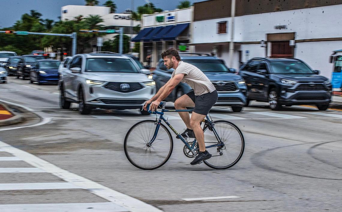 Jeremy Sapienza bikes on Alton Road and 17th Street in Miami Beach on July 7, 2023, not far from where he was involved in a road rage incident as he biked in the street near his house.