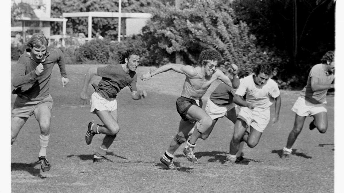 The Miami Toros soccer team takes wind sprints during a workout in 1974. The Toros were the first professional soccer team in Miami.