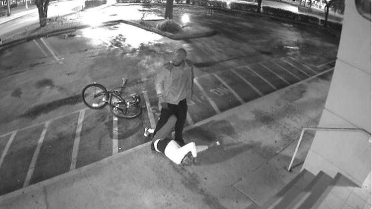 Surveillance camera photo after a shooting and robbery at a Pompano Beach Bank of America ATM. Broward Sheriff’s Office is looking for the lone man standing.