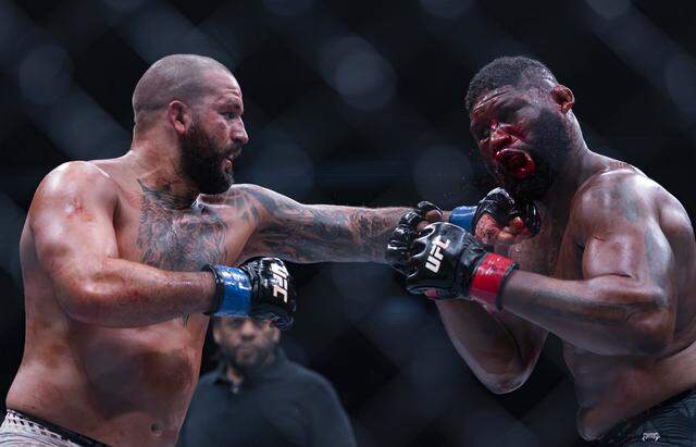 Curtis Blaydes of the United States and Josh Hokit of the United States fight in their heavyweight bout at UFC 327 at the Kaseya Center on Saturday, April 11, 2026, in downtown Miami, Fla.