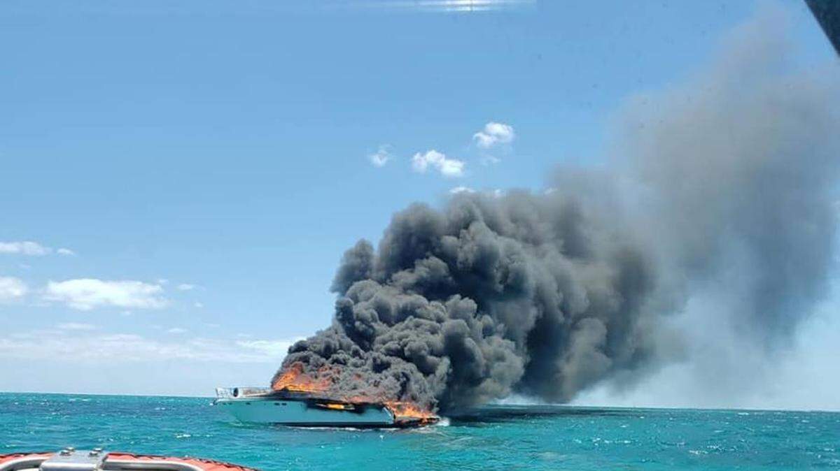 A 38-foot boat is completely covered in flames off the coast of Islamorada Wednesday afternoon, April 17, 2019.