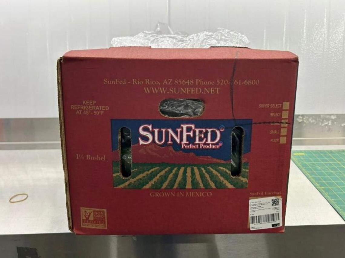 A box of SunFed cucumbers.