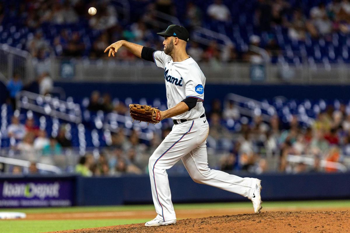 Miami Marlins catcher Jacob Stallings (58) throws the ball during the ninth inning of a MLB game against the Atlanta Braves at loanDepot Park, in Miami, Florida, on Wednesday, May 3, 2023.