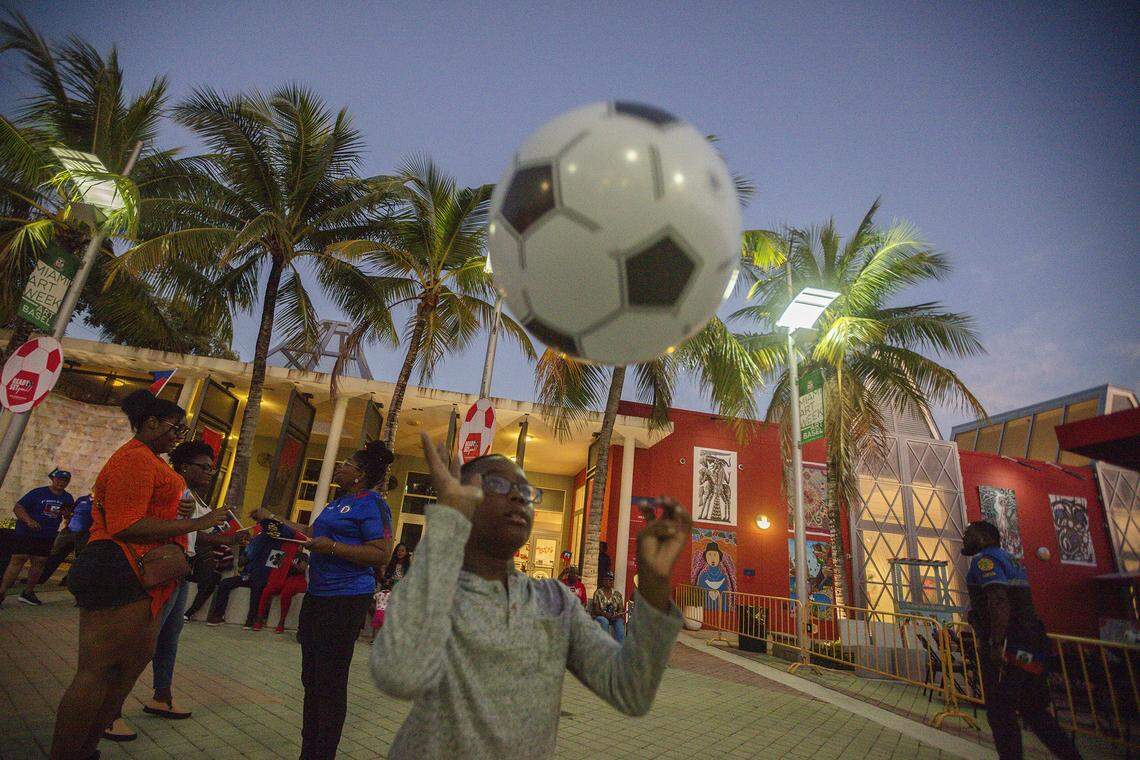 Jarvis Derival , 8 years old, plays with a ball during  Haitian World Cup Block Party at the Little Haiti Cultural Center in Little Haiti on Saturday, November 22, 2025.