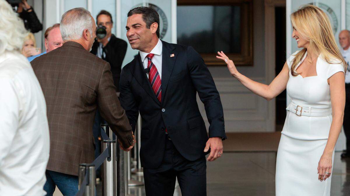 Miami Mayor Francis Suarez, with his wife, Gloria, greets audience members on June 15, 2023, before his first speech as a candidate for the 2024 Republican presidential nomination at the Ronald Reagan Presidential Library in Simi Valley, California.