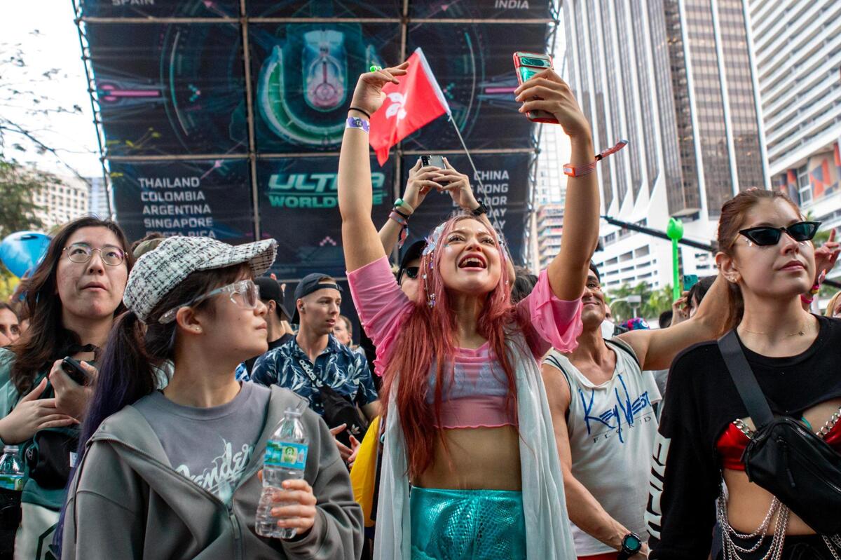 A woman reacts during a set at Ultra 2024 at Bayfront Park in Downtown Miami on Friday, March 22, 2024.