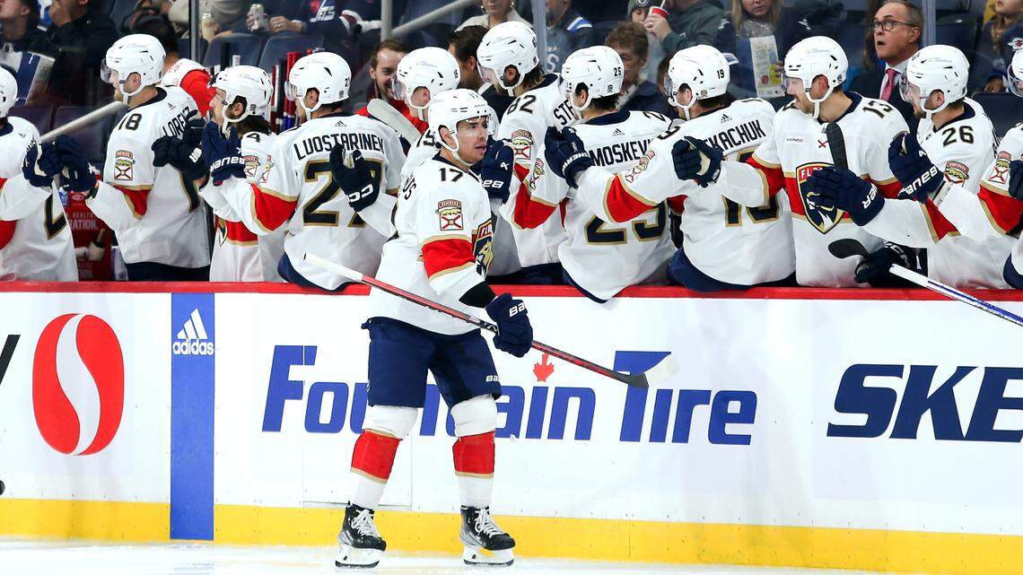 Oct 14, 2023; Winnipeg, Manitoba, CAN; Florida Panthers forward Evan Rodigues (17) celebrates with teammates after scoring a goal against the Winnipeg Jets during the first period at Canada Life Centre.