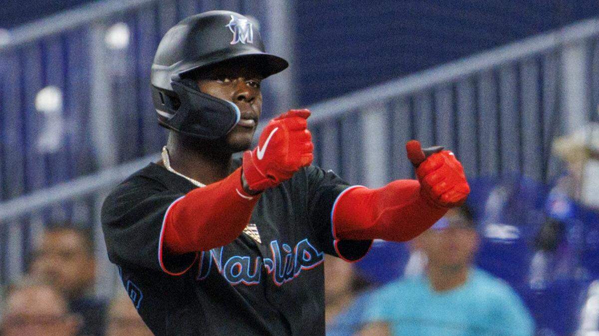 Miami Marlins second baseman Jazz Chisholm Jr. (2) reacts after hitting a single during the first inning of a baseball game against the New York Mets at LoanDepot Park on Friday, June 24, 2022 in Miami, Florida.