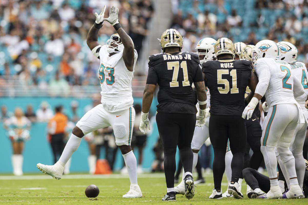Miami Dolphins defensive tackle Zeek Biggers (93) reacts after a play against the New Orleans Saints in the first half of their NFL game at Hard Rock Stadium on Sunday, Nov. 30, 2025, in Miami Gardens, Fla.