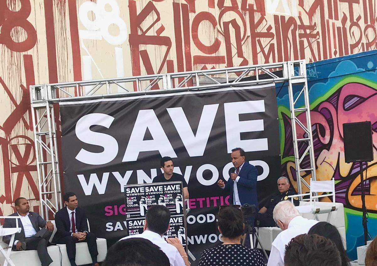 Commissioner Keon Hardemon, Mayor Francis Suarez, Swarm VP of marketing Albert Berdellans, Moishe Mana and Miami Police Chief Jorge Colina at the #SaveWynwood event on Tuesday afternoon at Mana Convention Center.