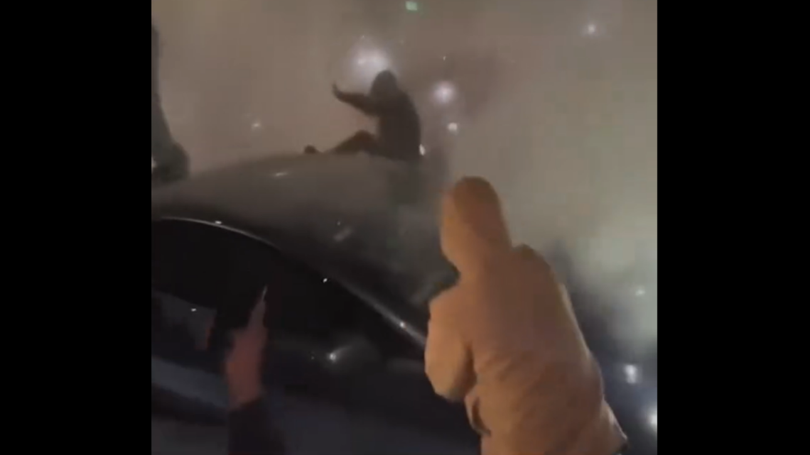 A Florida street takeover turned terrifying when spectators lit a fire at an intersection and began attacking the cars, cops say.