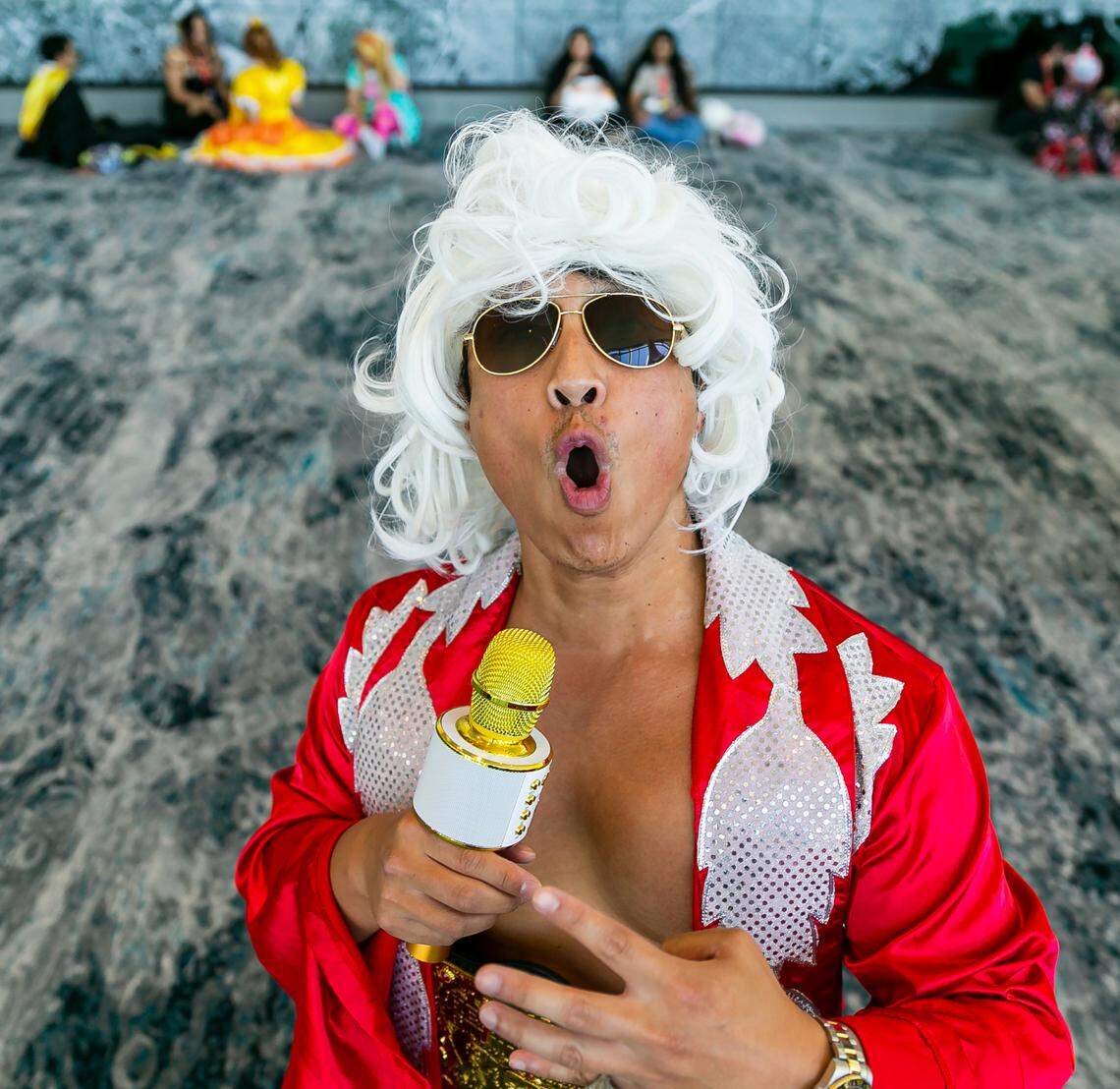 Jarvis Bolatete cosplays as wrestler Ric Flair during Florida Supercon.