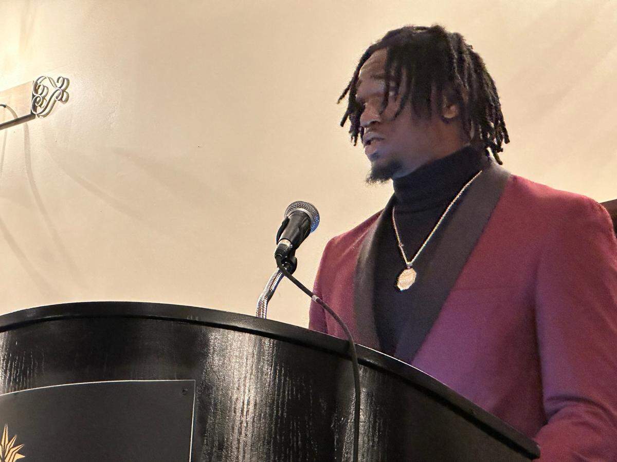 Plantation American Heritage running back Mark Fletcher speaks after being named one of four Scholar Athlete winners at the 48th annual Brian Piccolo Awards dinner on Wednesday night at the Signature Grand in Davie, Fla.