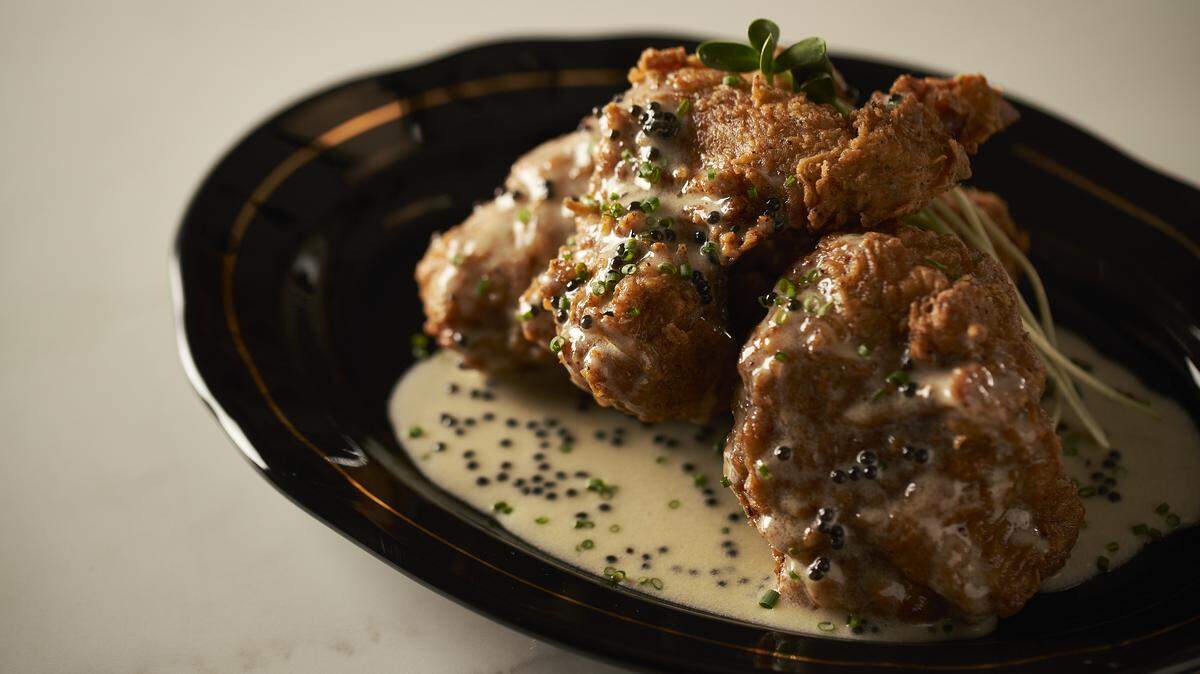 Fried chicken with caviar butter at Ember, the new restaurant by Brad Kilgore.