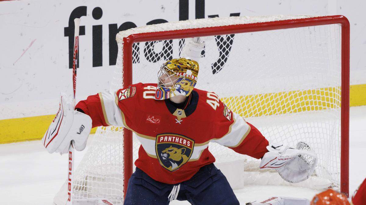 Florida Panthers goaltender Daniil Tarasov (40) blocks a shot on goal during overtime of a game against the Anaheim Ducks on Tuesday, Oct. 28, 2025, at Amerant Bank Arena in Sunrise, Fla. The Anaheim Ducks won 3-2 in a shootout.