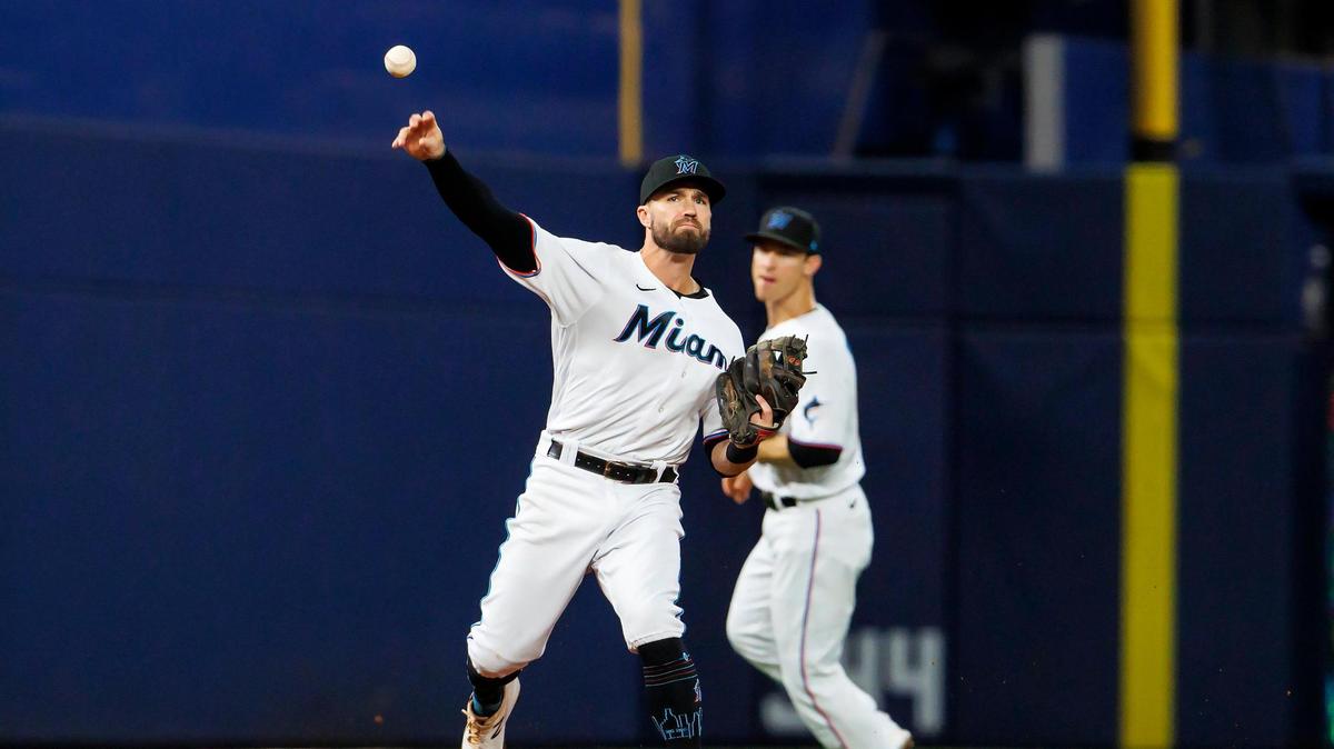Miami Marlins third baseman Jon Berti (5) throws to first base to put out Tampa Bay Rays center fielder Jose Siri (22) during the third inning of a baseball game at LoanDepot Park on Wednesday, August 31, 2022 in Miami, Florida.