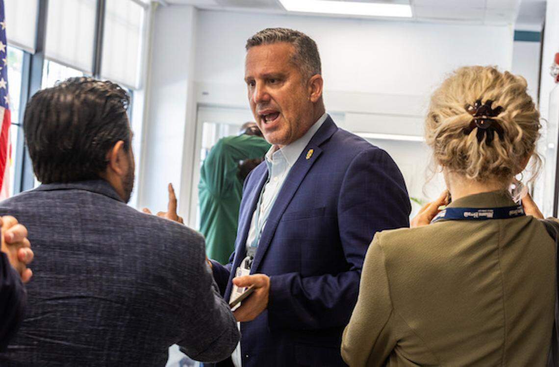 Senior Sgt. at Arms Alexander Lamprou reacts as Miami Herald reporters Sarah Blaskey and Joey Flechas asked questions to City of Miami Mayor Francis Suarez at Miami City Hall on Saturday, September 9, 2023.