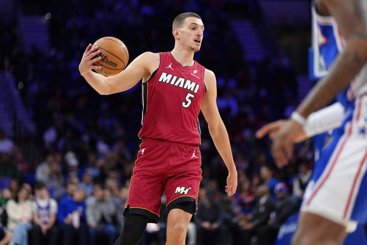 Miami Heat forward Nikola Jovic (5) controls the ball against the Philadelphia 76ers in the second quarter at Wells Fargo Center.