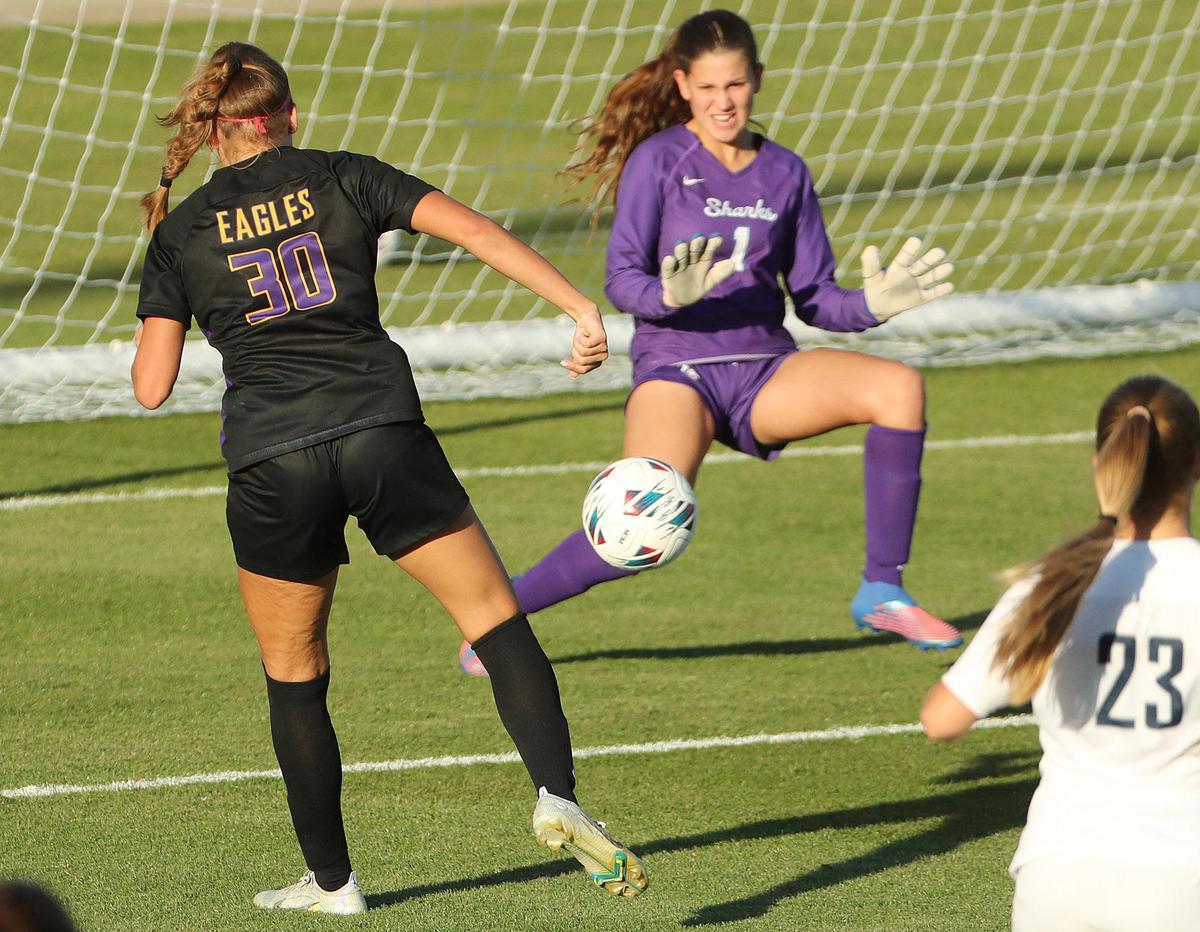 Montverde Academy player Estefania Gonzalez (30) scores a goal past NSU goalkeeper Avril Ramirez (1) during the FHSAA Class 3A state championship game of NSU University School versus Montverde Academy at Spec Martin Stadium in DeLand on Wednesday, February 22, 2023. Montverde won the match 6-0 to claim the state championship. (Stephen M. Dowell/Orlando Sentinel)