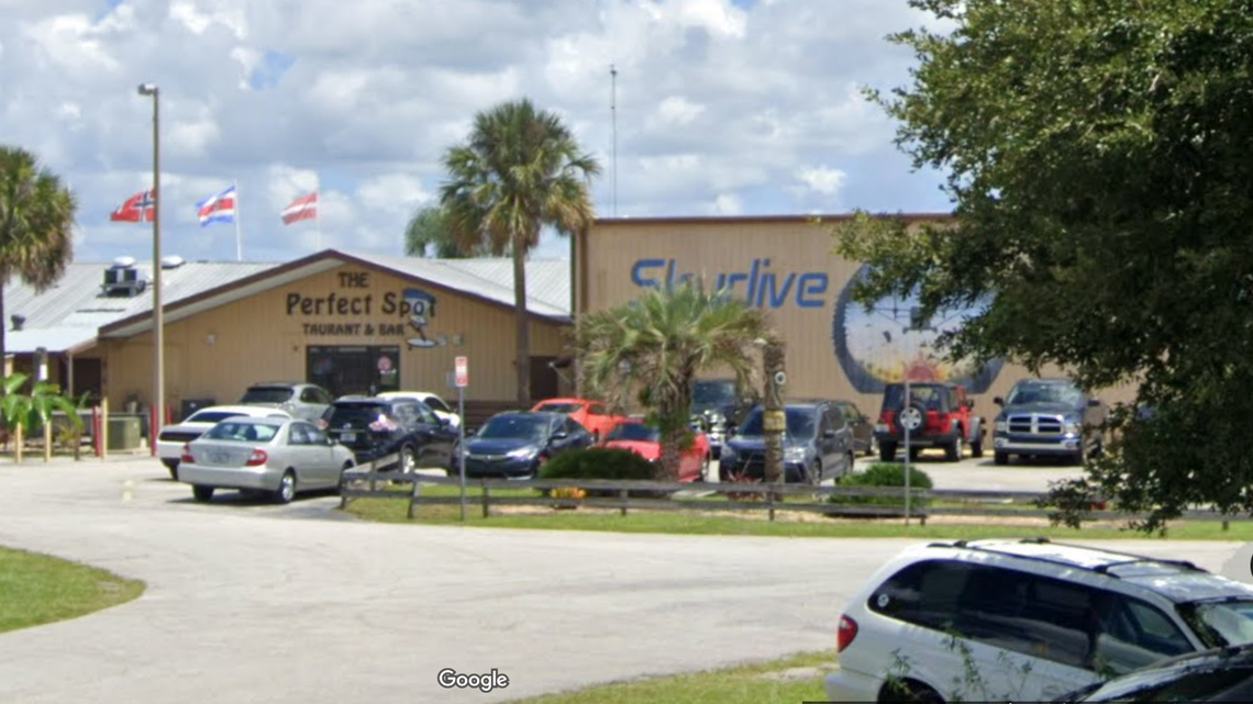 A 35-year-old Florida mom was charged with child neglect after she left her 7-year-old daughter sitting in the parking lot of The Perfect Spot bar for hours, DeLand police say.