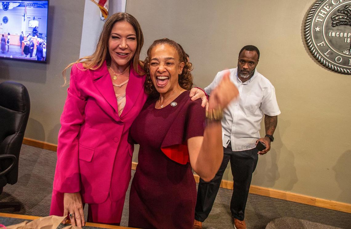 Chair Commissioner Christine King, right, posed with Sabina Covo, during Covo’s swearing ceremony at City Hall.
