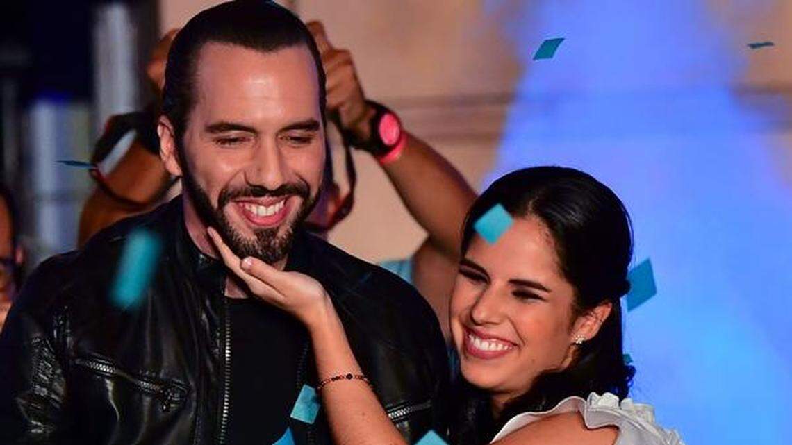 Nayib Bukele celebrates his first-round, third-party victory with his wife, Gabriela Rodríguez de Bukele, in February.
