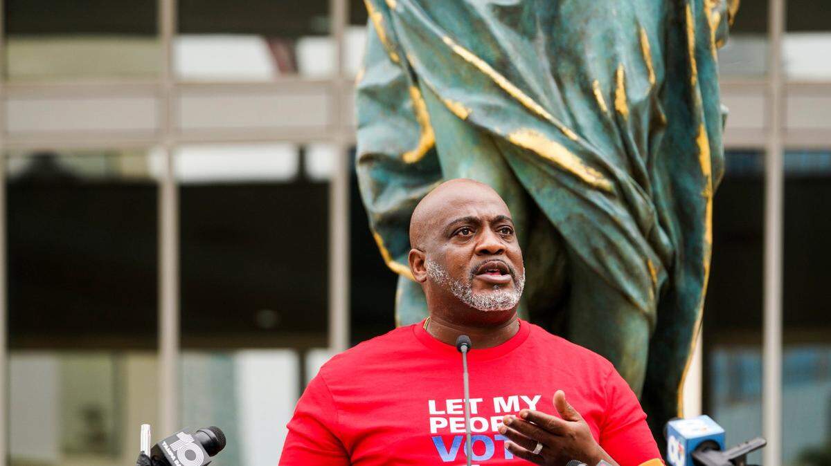 Desmond Meade, executive director of the Florida Rights Restoration Coalition, speaks during a press conference with other leaders to discuss how the fines and fees program will help returning citizens and the surrounding community, in front of the Hillsborough County Courthouse on Monday, Oct. 5, 2020, in Tampa.