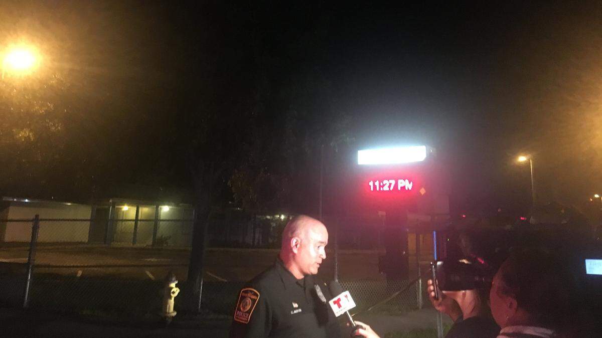 Carlos Austin, a spokesman for Miami Gardens police, briefs the media on the shooting Monday night in Miami Gardens.