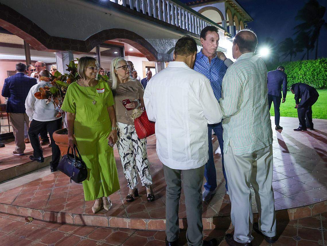 Jorge Suarez-Menendez, center, talks with Cuban and Cuban-American entrepreneurs as they gathered at his home for a private event on Tuesday, March 31, 2026, in Miami, Florida, to organize and pledge to invest in Cuba if there is a change in government.