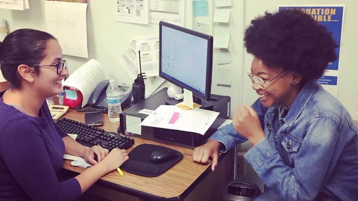 A student receives mentoring from a CIS coordinator.