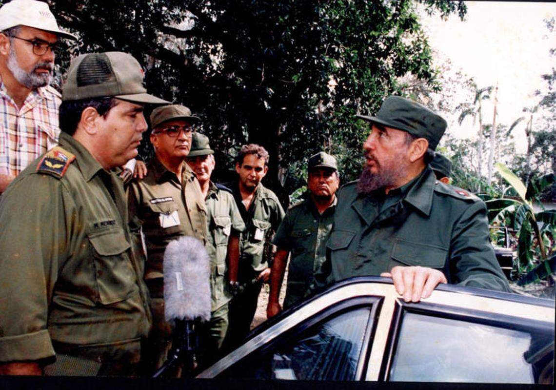 Manuel Menendez Castellanos, a former Cuban Communist Party leader, is pictured with FIdel Castro in 1996