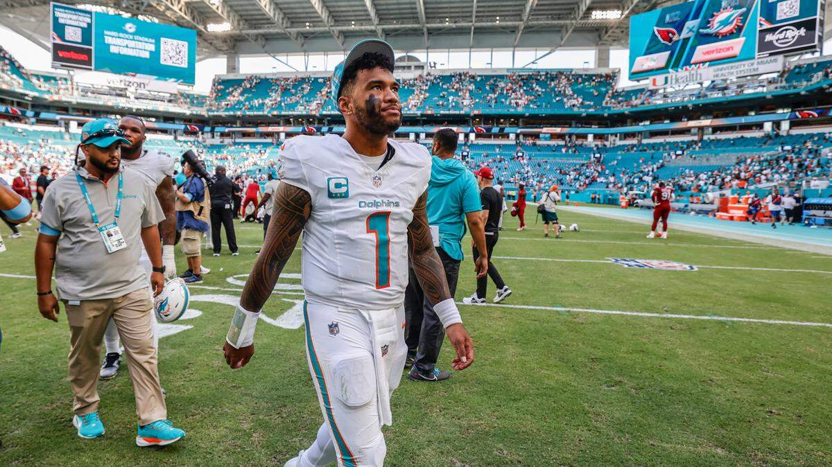 Miami Dolphins quarterback Tua Tagovailoa (1) walks off the field after the loss against the Arizona Cardinals during an NFL football game at Hard Rock Stadium in Miami Gardens, Florida on Sunday, October 27, 2024. 