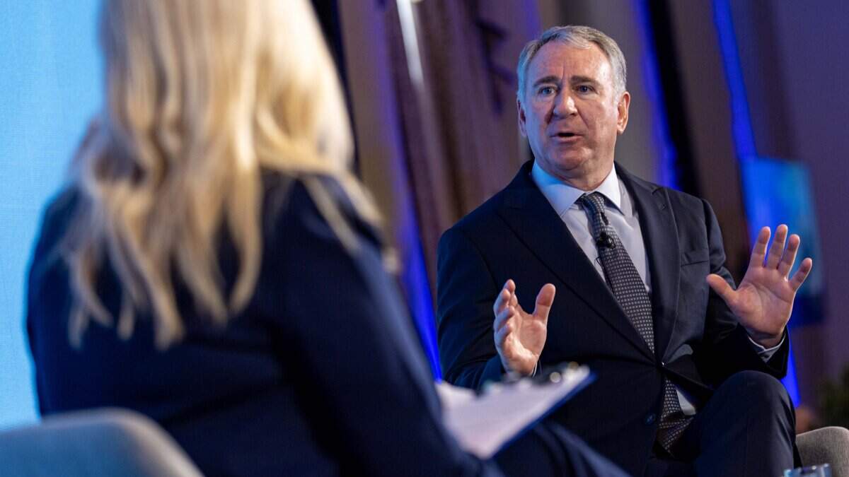 Citadel CEO Ken Griffin speaks with Palmetto Bay Mayor Karyn Cunningham during a conference hosted by the Miami-Dade County League of Cities in 2024.