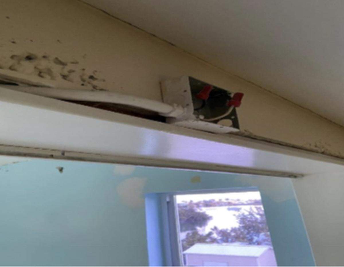 A photo taken by inspectors with Cueto Engineering shows exposed wiring along the walls of Mariner Place apartments in the Middle Florida Keys city of Marathon.