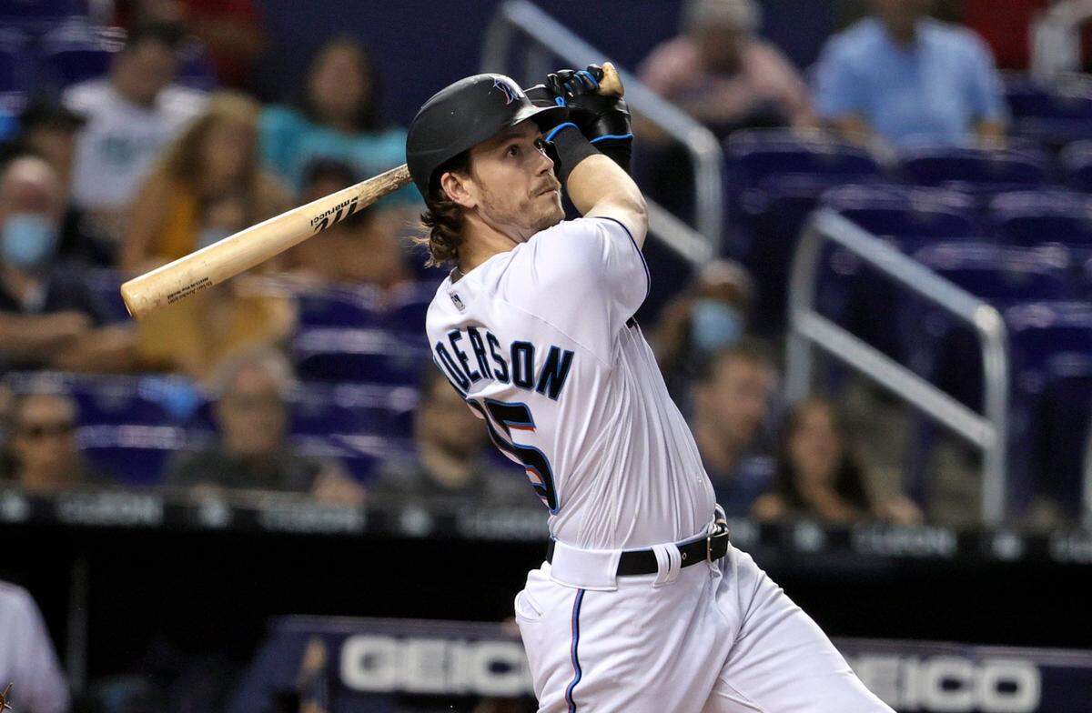 Miami Marlins third baseman Brian Anderson (15) batting against the Washington Nationals during the first inning of their baseball game at loanDepot park on Thursday, August 26, 2021 in Miami, Florida.