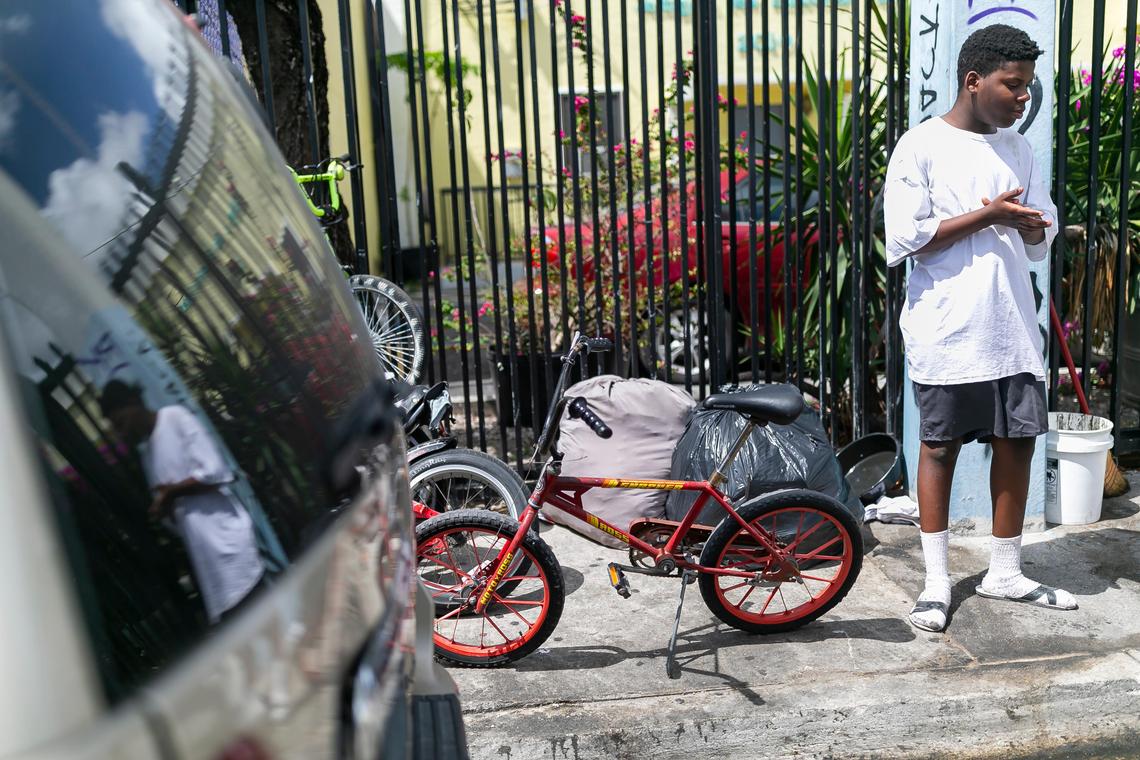 Jawan Williams, 19, spends time near the Miami Rescue Mission Clinic as concerns over COVID-19 continue to spread through South Florida.