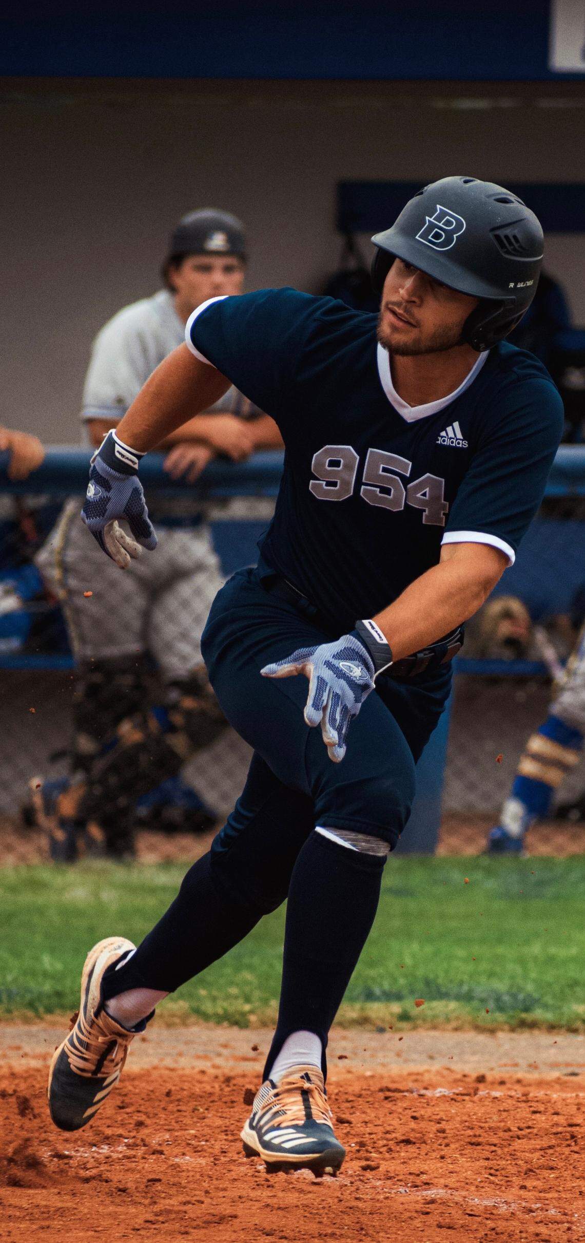 Tommy Diaz runs to first base in one of JUCO Broward College’s likely final games. Broward is poised to cut its athletics programs next year as part of the college’s new budget proposal, which will be voted on June 30.